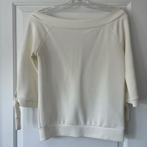 Off the shoulder cream blouse